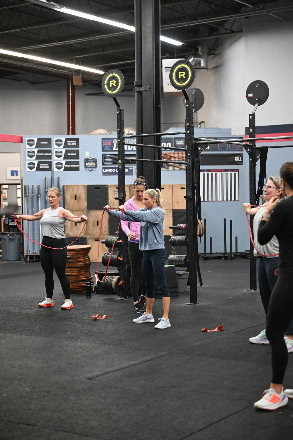 Women's strength training with resistance bands at StrongHER class Charlestown
